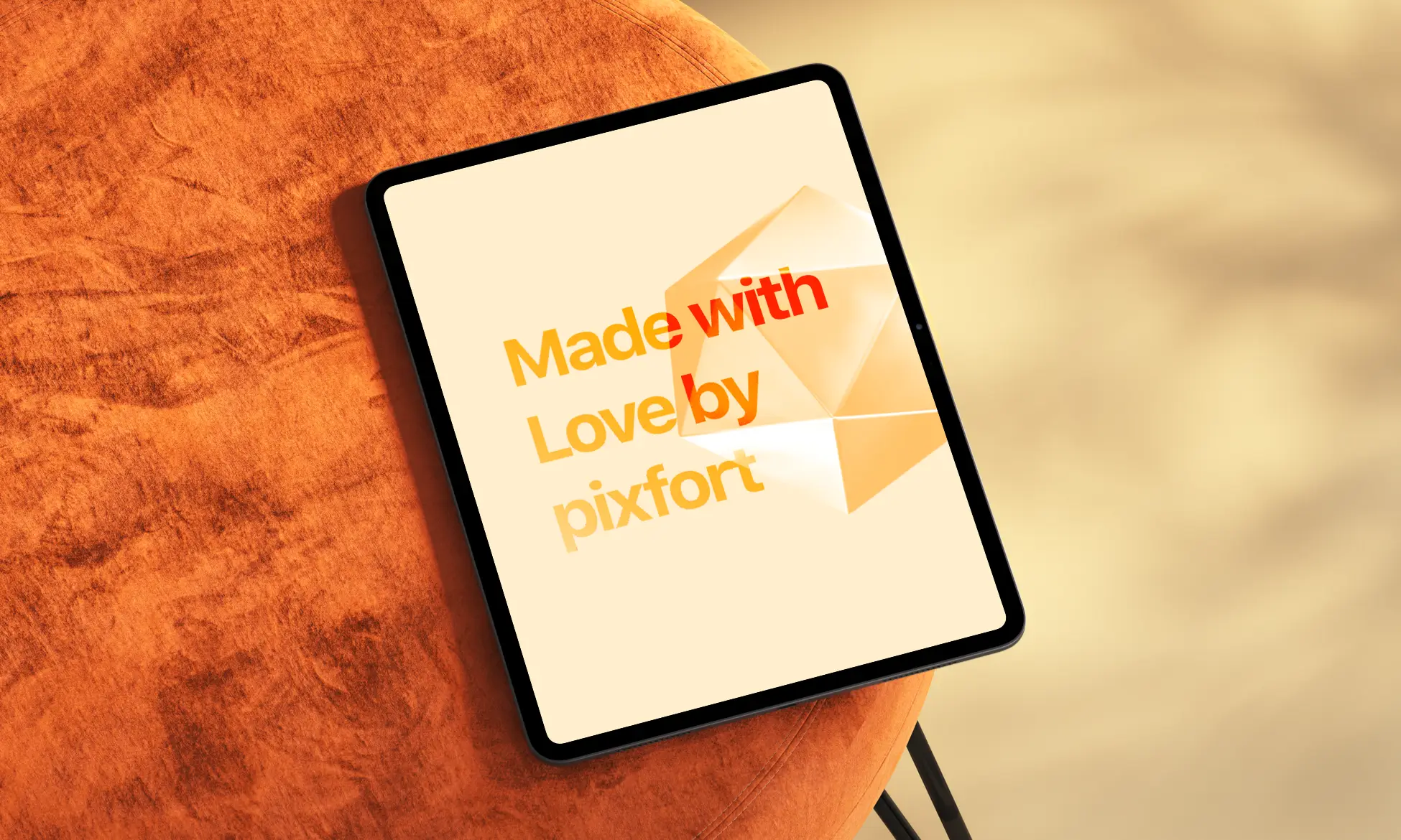 Tablet on an orange cushion showing the phrase 'Made with love by pixfort' over a geometric yellow background.